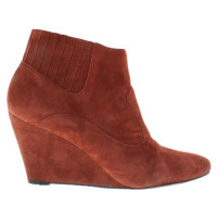 Bash Ankle boots in rust red