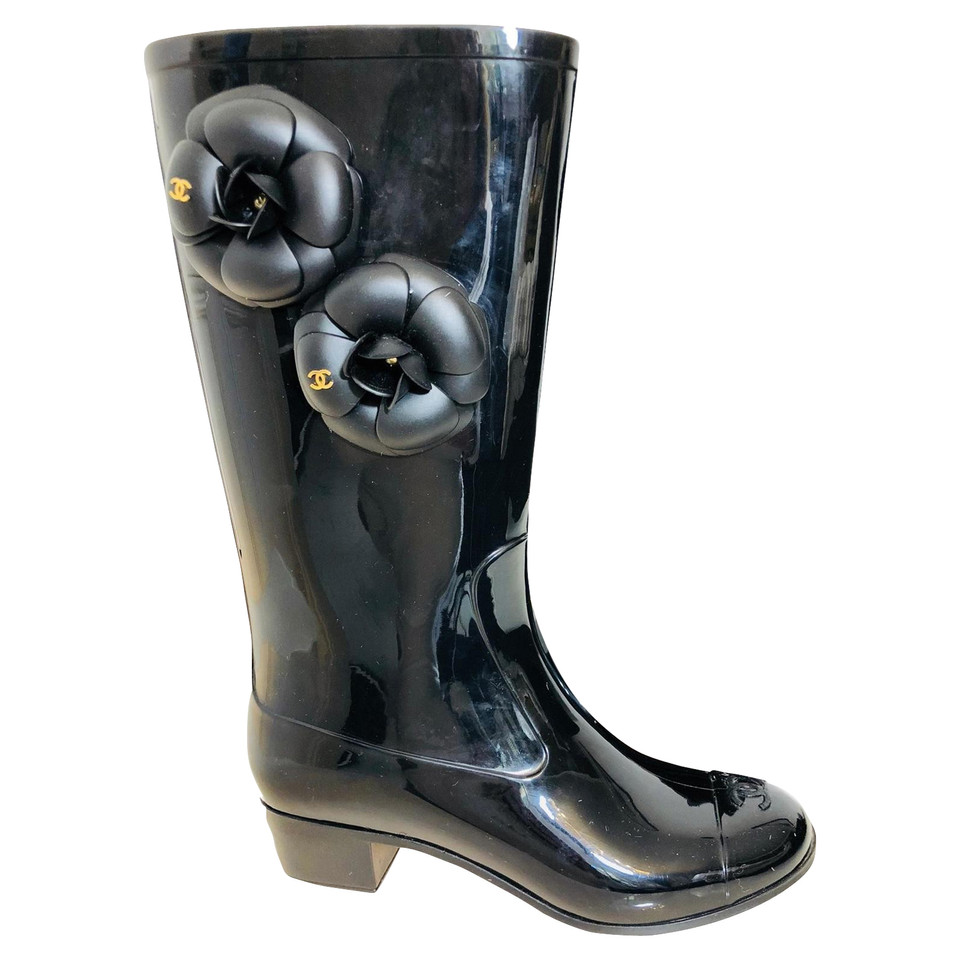 Chanel Rubber boots with camellias