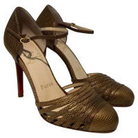 Christian Louboutin pumps in golden brown