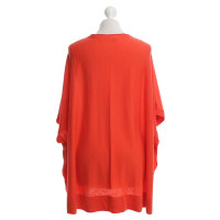 Laurèl poncho tricotée à Orange