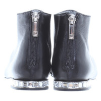 Jourdan Black leather ankle boots