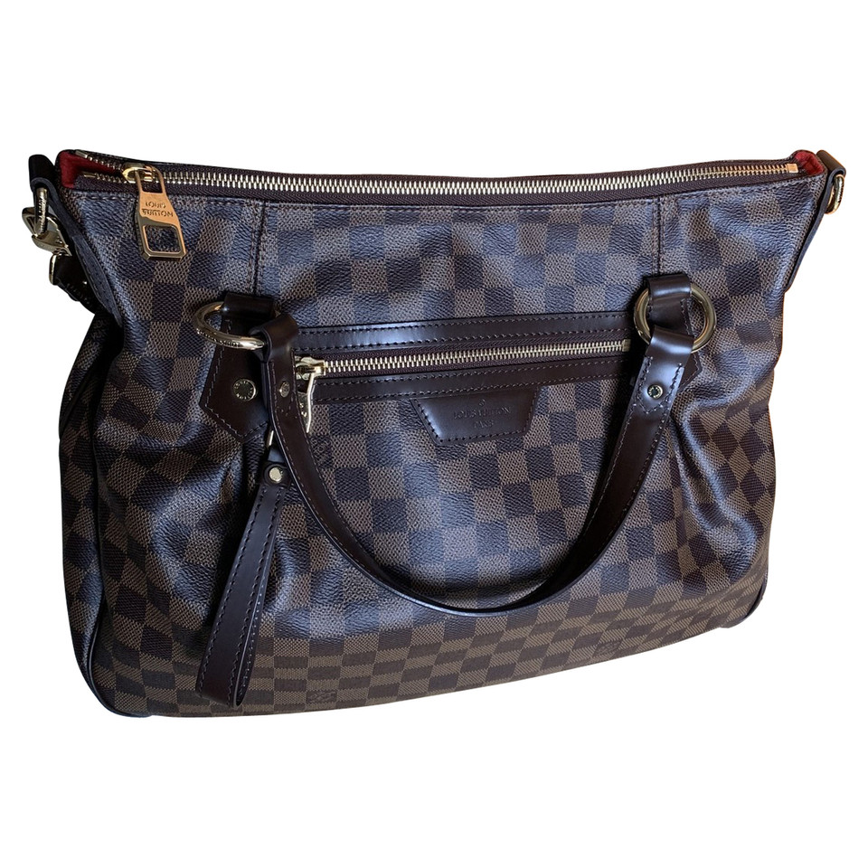 Louis Vuitton Handbag Canvas in Brown