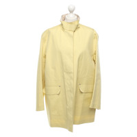 Hermès Jacke/Mantel aus Baumwolle in Gelb
