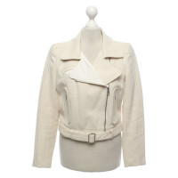 Carven Jacke/Mantel aus Baumwolle in Creme