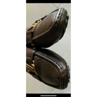 Louis Vuitton Schnürschuhe aus Leder in Braun