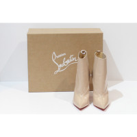 Christian Louboutin Ankle boots Patent leather in Nude