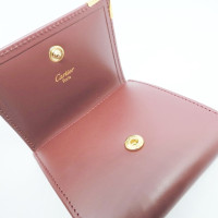 Cartier Täschchen/Portemonnaie aus Leder in Bordeaux