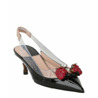 Gucci Pumps/Peeptoes aus Leder in Schwarz