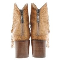 Cesare Paciotti Ankle boots with reptile embossing
