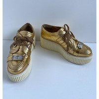 Chanel Trainers Leather in Gold
