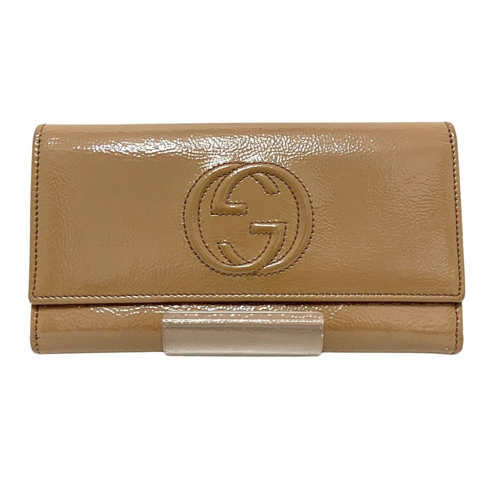 Gucci Täschchen/Portemonnaie aus Leder in Braun