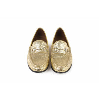 Gucci Slipper/Ballerinas in Gold