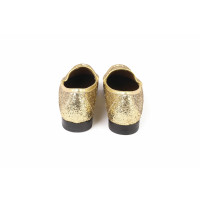 Gucci Slippers/Ballerinas in Gold