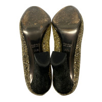 Miu Miu Sandals in Gold