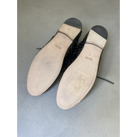 Saint Laurent Chaussures à lacets en Cuir verni en Noir