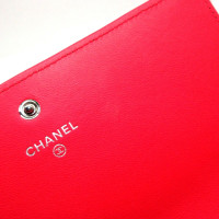 Chanel Sac à main/Portefeuille en Cuir verni en Rose/pink