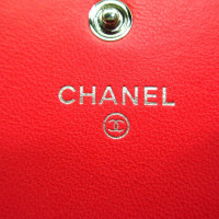 Chanel Sac à main/Portefeuille en Cuir verni en Rose/pink