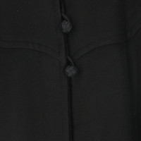 Yves Saint Laurent Jacke/Mantel aus Wolle in Schwarz