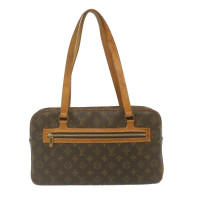 Louis Vuitton Cite Canvas in Brown