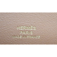 Hermès Kelly Pochette Leer in Goud
