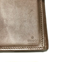 Gucci Täschchen/Portemonnaie aus Leder in Beige