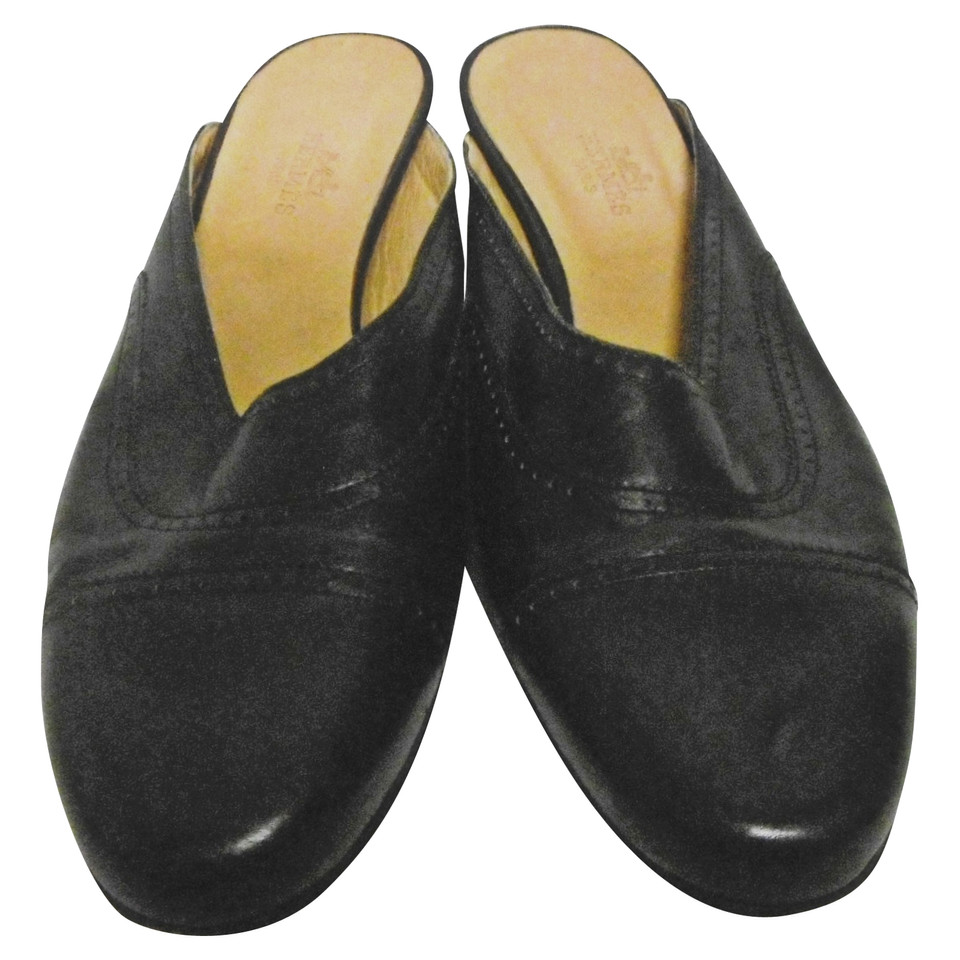 Hermès Slipper/Ballerinas aus Leder in Schwarz