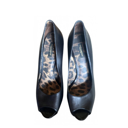 Dolce & Gabbana Pumps/Peeptoes aus Leder in Schwarz