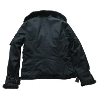 Christian Dior Jacke/Mantel aus Baumwolle in Schwarz