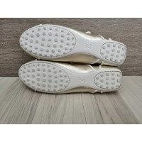 Louis Vuitton Slipper/Ballerinas aus Leder in Gold