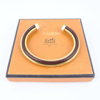 Hermès Armreif/Armband aus Vergoldet in Braun