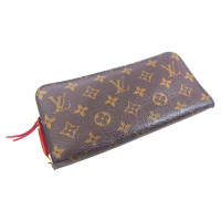 Louis Vuitton Täschchen/Portemonnaie aus Canvas in Braun