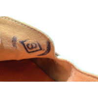 Hermès Sandalen aus Leder in Creme