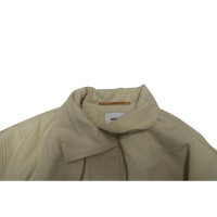 Nanushka  Jacke/Mantel aus Baumwolle in Beige