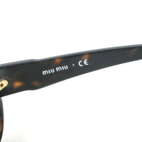 Miu Miu Glasses in Brown