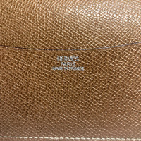 Hermès Täschchen/Portemonnaie aus Baumwolle in Gold