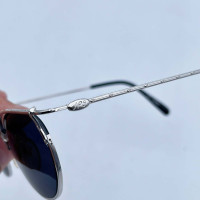 Jean Paul Gaultier Sunglasses in Silvery