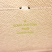 Louis Vuitton Clemence Wallet aus Canvas in Gold