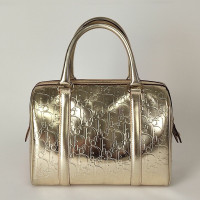 Christian Dior Handtasche aus Leder in Gold