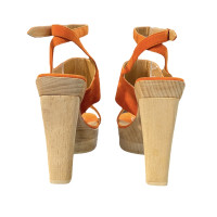 Hermès Sandalen aus Wildleder in Orange