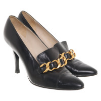 Chanel Pumps/Peeptoes aus Leder in Schwarz