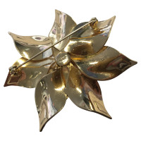 Christian Dior Gold colored brooch