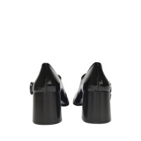 Carel Pumps/Peeptoes aus Leder in Schwarz