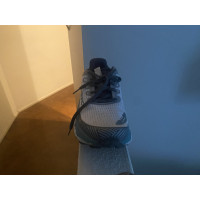New Balance Sneaker in Tela in Bianco