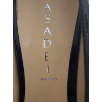 Casadei pumps/Peeptoes made of leather in purple/brown