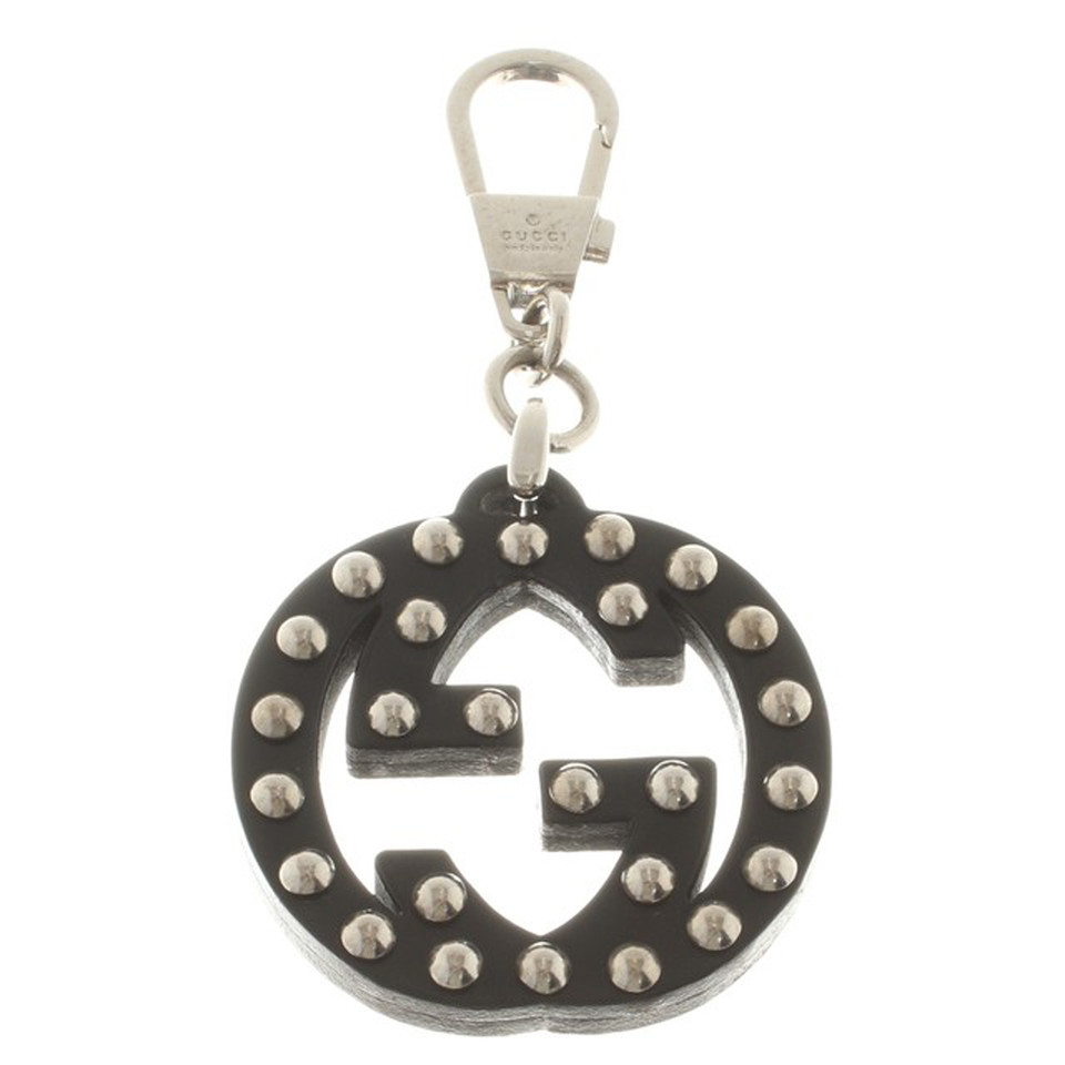 Gucci Logo pendant with rivets