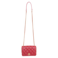 Chanel Classic Flap Bag New Mini aus Leder in Rot