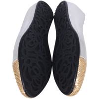 Jimmy Choo Slipper/Ballerinas aus Leder in Silbern