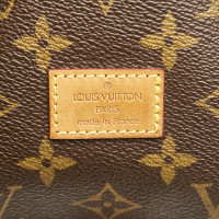 Louis Vuitton Saumur Canvas in Brown