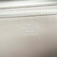 Louis Vuitton Comete Canvas in Gold