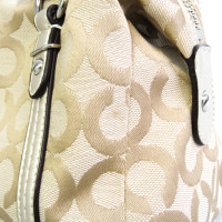 Coach Handtasche aus Canvas in Beige